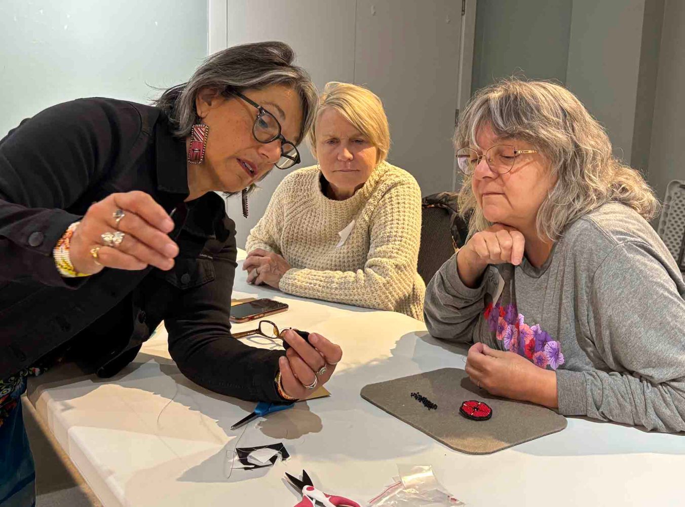 Beaded poppy carries extra respect, remembrance