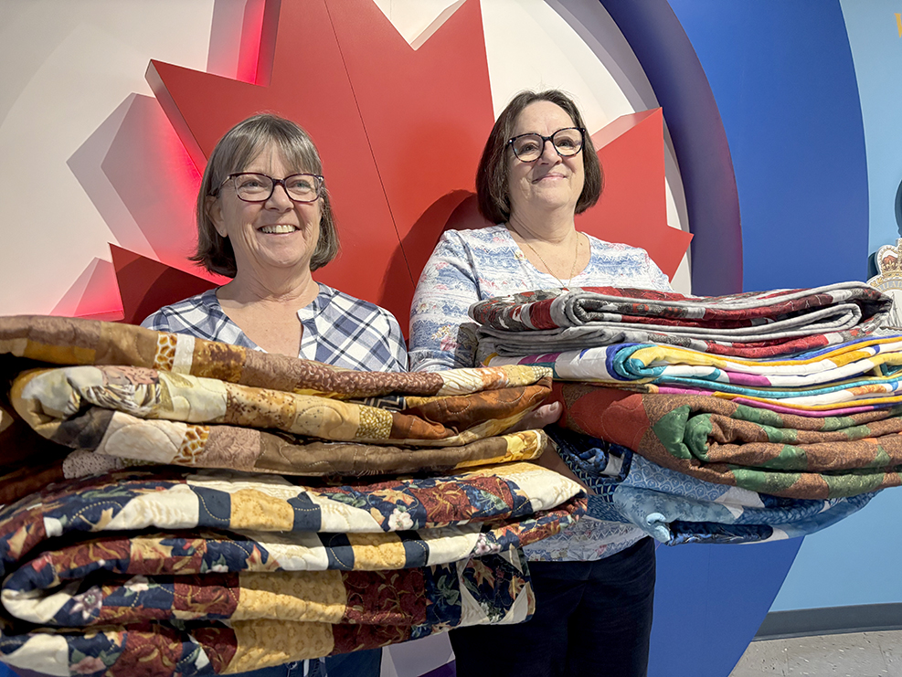 Pile of colour, comfort in recent Quilts of Valour presentation